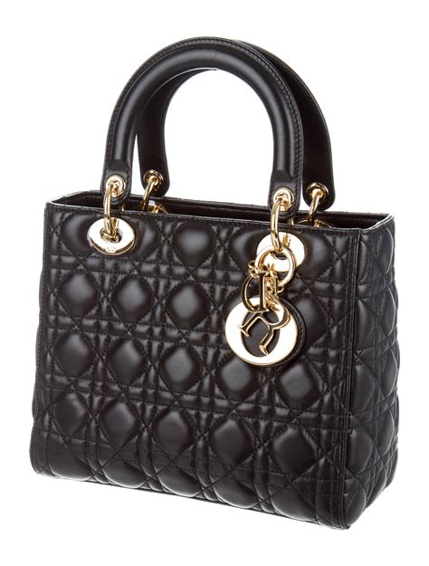 lady handbag by christian dior styled in black cannage canvas|medium lady dior handbags.